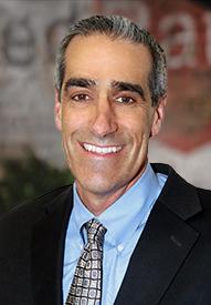 Chuck Isola headshot